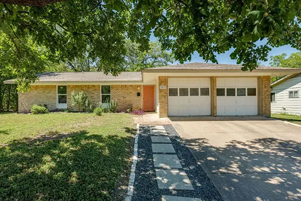 Sell Home Fast in Austin Before Relocation Single-story Austin house with garage and front yard — ideal property to sell fast before relocating or moving out of Austin.