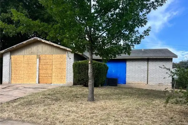 Sell your boarded-up or damaged house fast in Austin, TX Boarded-up damaged house in Austin, TX — Austin all cash house buyer buys homes as-is, in any condition, including fire, water, and storm damage.